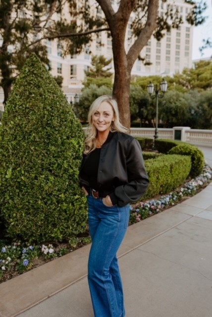 CPA for Photographers Jamie Boyack from Aloha Friday CPA standing in front of a tree on the strip in Las Vegas 